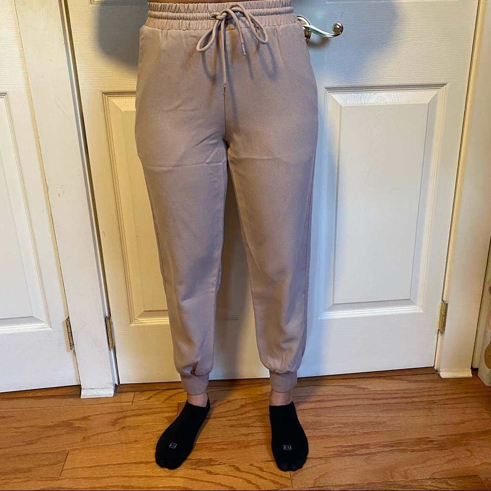 Cream shinestar joggers.